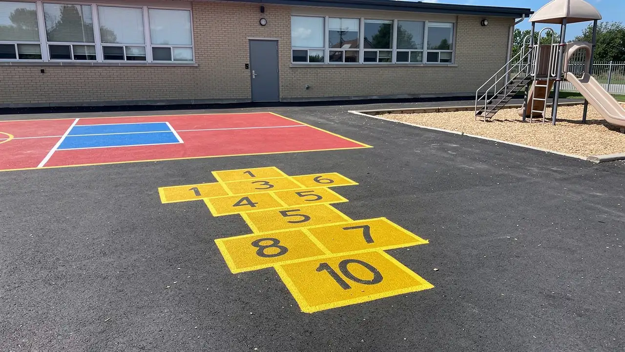 Bright hopscotch and four square school yard Bright hopscotch and four square school yard