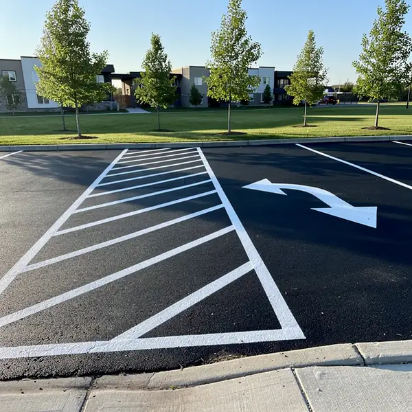 Bright white stall lines on sealed asphalt