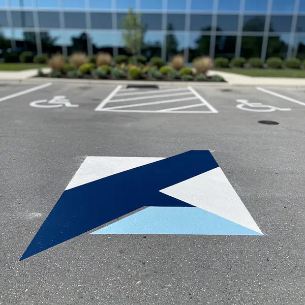 Custom logo stencil painted at entrance Custom logo stencil painted at entrance