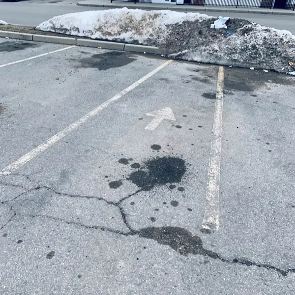 Faded parking lot lines awaiting restripe quote