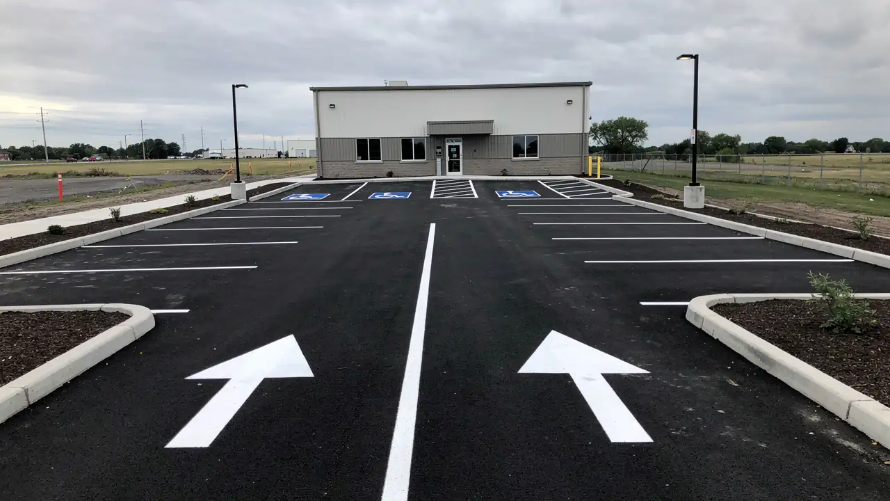 New asphalt lot with fresh stall layout New asphalt lot with fresh stall layout