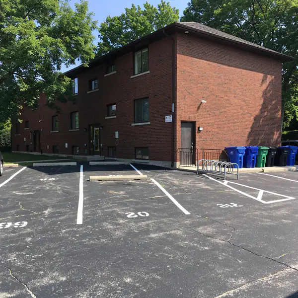 Numbered stalls behind Waterloo student walk-up