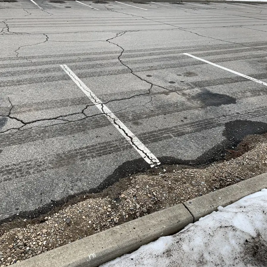 Plow scraped parking lines after Kitchener winter Plow scraped parking lines after Kitchener winter