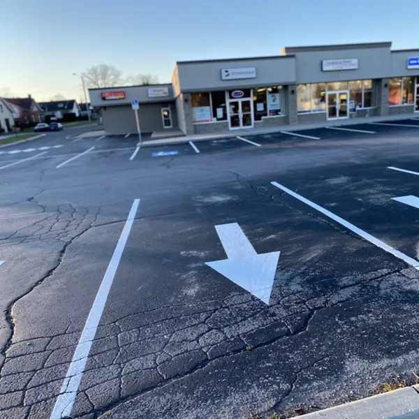 Restriped strip plaza parking stalls Kitchener Restriped strip plaza parking stalls Kitchener