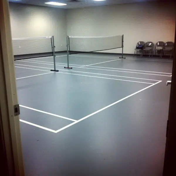 Row of taped badminton courts community centre Row of taped badminton courts community centre